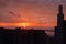 Panoramic view of the evening city of Dnipro, Ukraine. Beautiful sunset, silhouettes of houses and skyscraper