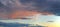 Panoramic view of the evening sky and beautifully sunlit clouds