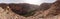 Panoramic view of famous Amtoudi gorge and the Aguellouy agadir, an old granary, in the Anti-Atlas mountains