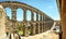 Panoramic view of the famous ancient aqueduct in Segovia, Spain