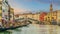 Panoramic view of famous Canal Grande with famous Rialto Bridge at sunset, Venice