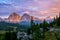 Panoramic view of famous Dolomites mountain peaks glowing in beautiful golden evening light at sunset in summer, South Tyrol,