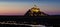 Panoramic view of famous historic Le Mont Saint-Michel tidal island on a sunny day with blue sky and clouds in summer, Normandy.