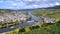A panoramic view of the famous Mosel river overlooking the picturesque town of bercastel-Kues, Germany.
