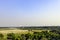 Panoramic view of fields with Taj Mahal in background - Agra, India