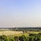 Panoramic view of fields with Taj Mahal in background - Agra, India