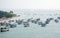 Panoramic view of fishing trawlers anchored in sea