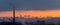 Panoramic view of a foggy industrial city smoke fog and sunset