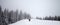 Panoramic view on footpath in snow and hikers going up on snowy slope