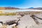 Panoramic view of frozen salty lake on the way to the famous Uyuni Salt Flat, travel destination in Bolivia.