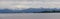 Panoramic view of German lake `Starnberger See` with beautiful alp mountains