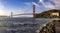 Panoramic view of the Golden Gate Bridge in San Francisco from a shore of the bay of the Californian city.