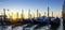 Panoramic view of gondolas in Venice at sunrise