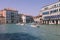 Panoramic view of Grand Canal (Canal Grande) with active traffic boats