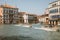 Panoramic view of Grand Canal (Canal Grande) with active traffic boats