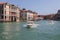 Panoramic view of Grand Canal (Canal Grande) with active traffic boats