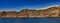 Panoramic view of the Greek island of Santorni, as seen from cruise ship at sea.