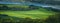 Panoramic View of Green Farming Fields
