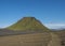 Panoramic view on green Hattafell mountain in Volcanic landscape behind Emstrur camping site with hikers on Laugavegur