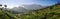 Panoramic view of the green lush tea hills and mountains around Munnar, Kerala, India