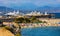 Panoramic view of harbor and Plage de la Gravette beach at historic old town onshore Mediterranean Sea in Antibes city in France