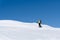 Panoramic view of healthy male person cross-country skiing in beautiful nordic winter landscape in Austria with blue sky