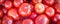 Panoramic view heap of red tomatoes in food crate at farmer market in Washington, USA