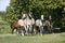 Panoramic view of herd of horses while running home on rural animal farm