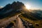 A panoramic view from hikers to the summit of a remote mountain peak, showcasing a sprawling wilderness below