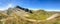 Panoramic view of a hiking trail through the Austrian Alps in the high mountains of the Zillertal near the Tux Glacier in summer,