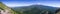 Panoramic view of the hiking trail to Black Butte\'s top and the forests and summit of Shasta mountain covered in snow; Siskiyou