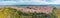 Panoramic view of the hills, the town of Enna on the valley with green meadows and forests in Sicily