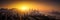 Panoramic view of Hong Kong skyline at sunset