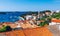 Panoramic view of Hvar town with lots of red roofs in Croatia. Hvar houses and roofs mediteranean town. Beautiful stacked houses