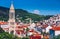 Panoramic view of Hvar town with lots of red roofs in Croatia. Hvar houses and roofs mediteranean town. Beautiful stacked houses