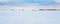 Panoramic View of Idyllic Winter Scenery: Frosty Landscape with Snowdrifts