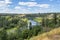 Panoramic view of Kayakers enjoying a summer day on the Spokane River near Nine Mile in Spokane, Washington.