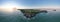 Panoramic view of Knockadoon Head signal tower and Capel Island in Cork, Ireland, at sunset