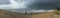 Panoramic view of the Kodi beach under the cloudy skies