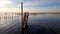 Panoramic view of Lake Albufera in Valencia, at sunset, with calm water, near fishing nets
