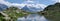 Panoramic view on lake in Alps