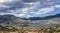 Panoramic view of Lake Potrerillos in the Mendoza region of Argentina with clouds