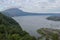 Panoramic view of a lake surrounded by mountain, tropical landscape with colorful clouds in the sky. Danau Batur, Gunung Batur