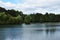 Panoramic view of the lake with wooded banks