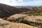 Panoramic view at landscape between Betancuria and Pajara  on Fuerteventura with multi colored volcanic hills and mountains