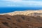 Panoramic view at landscape from viewpoint Mirador Morro Velosa on Fuerteventura with  multi colored volcanic mountainss and the