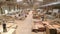 Panoramic view of a large furniture factory. People work in a furniture factory. Large furniture manufacturing plant