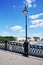 Panoramic view of the lighting pole, bridge parapet and bypass road.