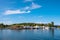 Panoramic view of Lindoya island on Oslofjord harbor near Oslo, Norway, with Lindoya Ost marina and summer cabin houses at