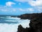 Panoramic view of Los Hervideros. Southwest coast, rugged volcanic coast, strong surf, sea caves, lava hills. Lanzarote,